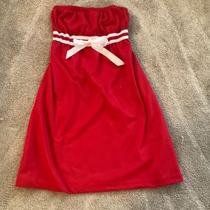 Adorable red dress with white bow